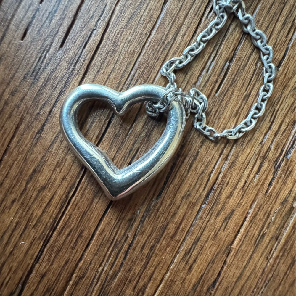 Gently used Sterling silver heart necklace.